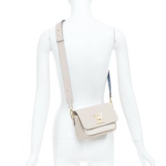 LOUIS VUITTON Lockme Tender greige grained leather gold LV logo crossbody bag