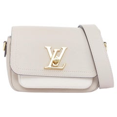 LOUIS VUITTON Lockme Tender greige grained leather gold LV logo crossbody bag