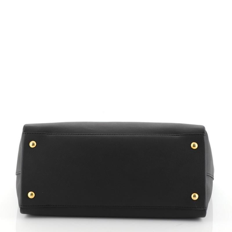 Louis Vuitton Lockmeto Handbag Leather In Good Condition In NY, NY
