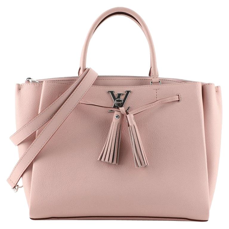 are louis vuitton bolsas real leather