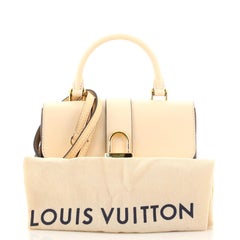 Sac à main Louis Vuitton Locky en toile monogrammée avec cuir BB