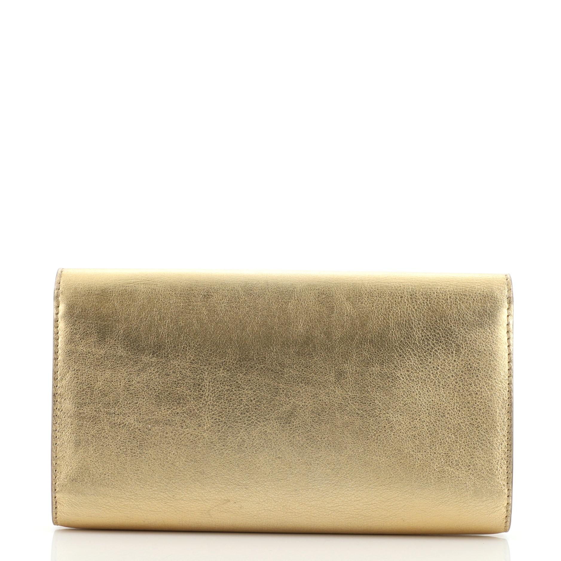 Lange Louis Vuitton Louise Clutch aus Leder im Zustand „Gut“ in NY, NY