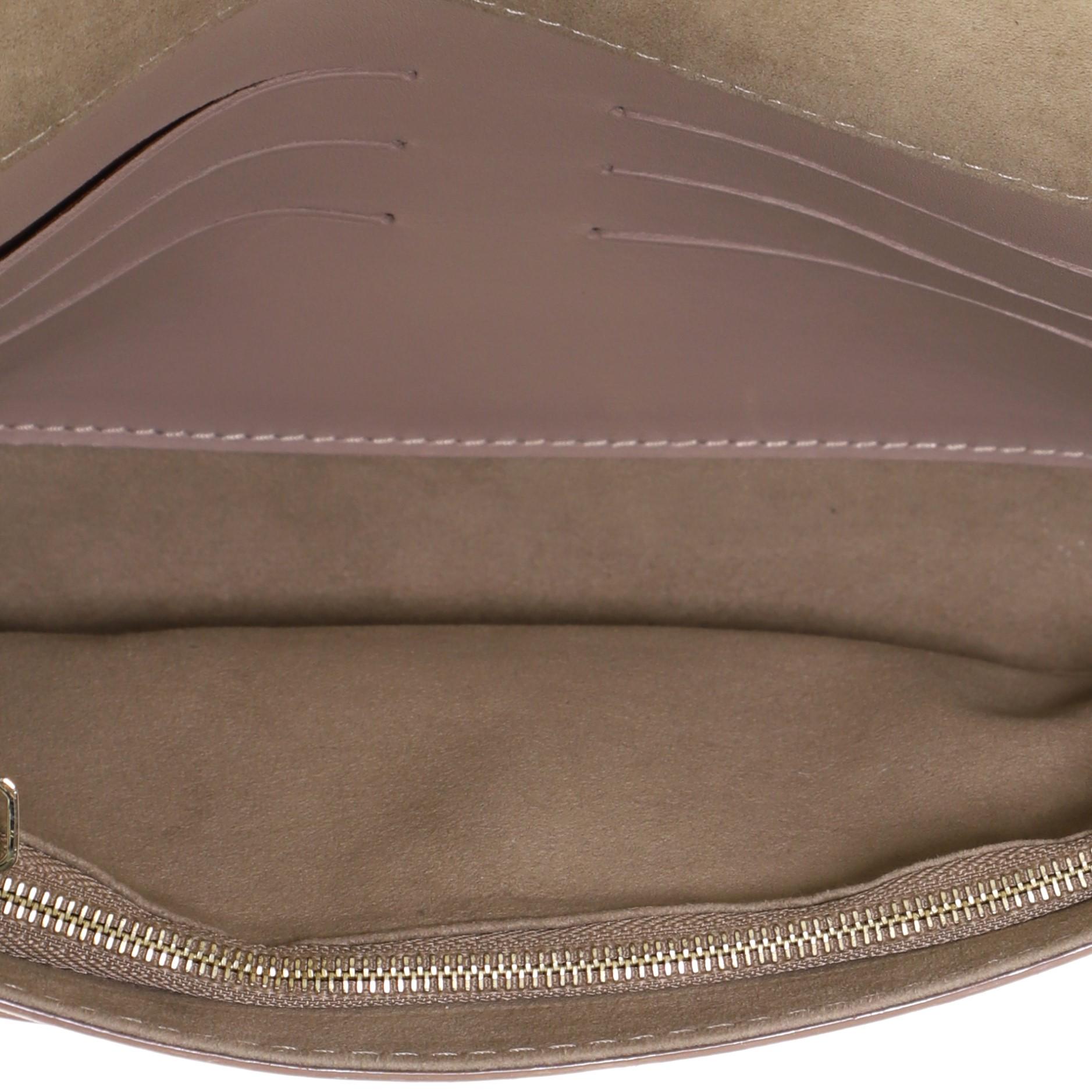 Lange Louis Vuitton Louise Clutch aus Leder 1