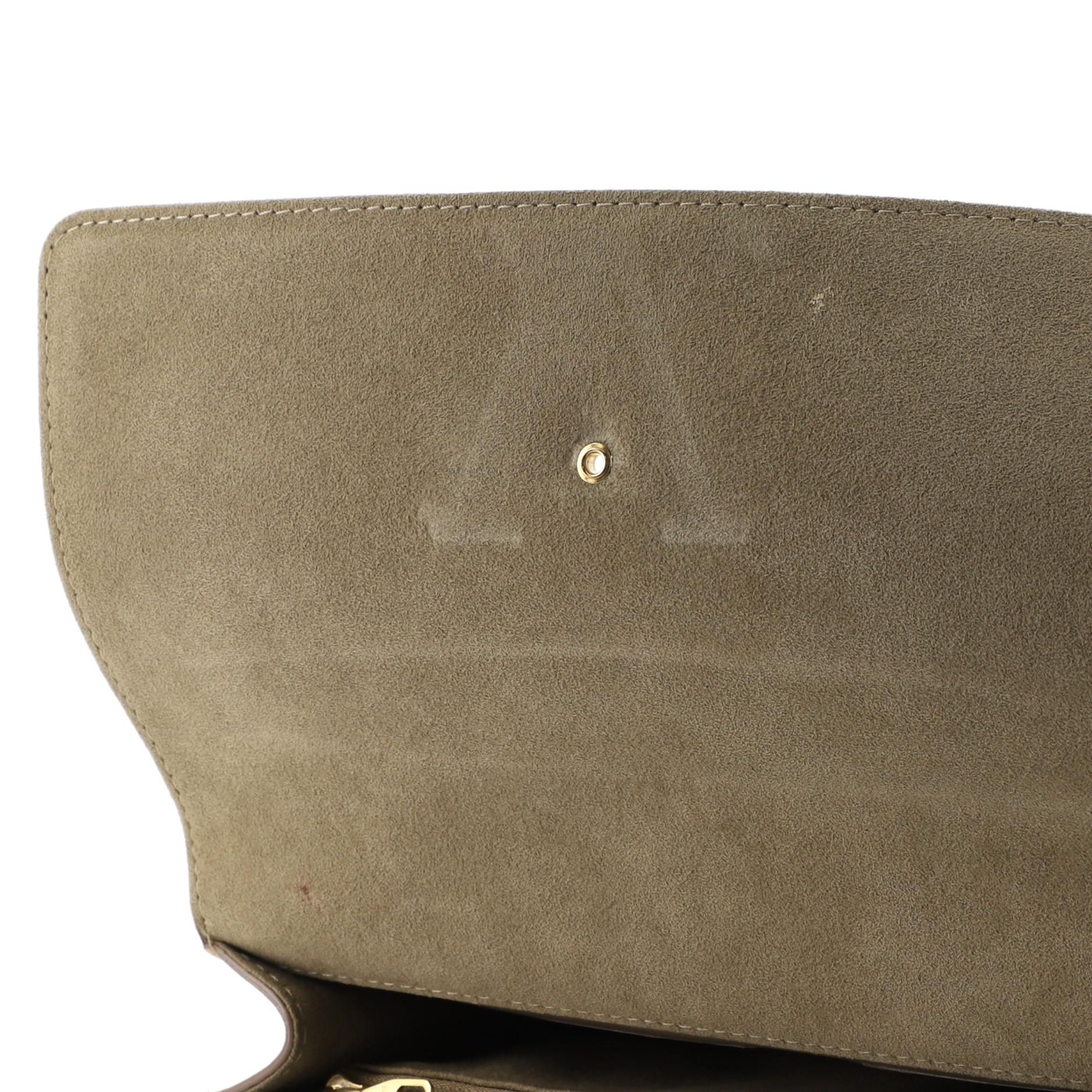 Lange Louis Vuitton Louise Clutch aus Leder 2