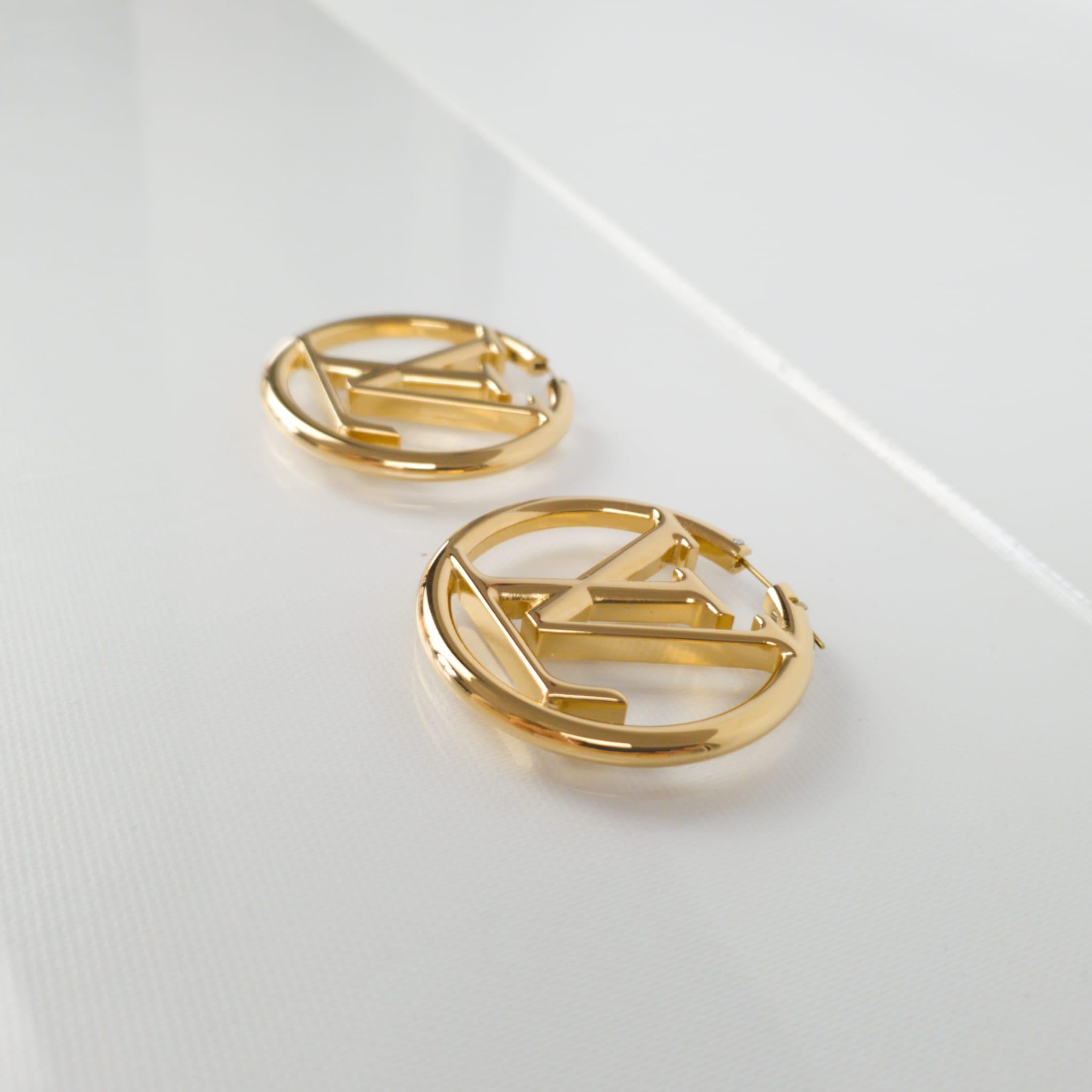Louis Vuitton Gold LV Logo Hoop Earrings For Sale at 1stDibs