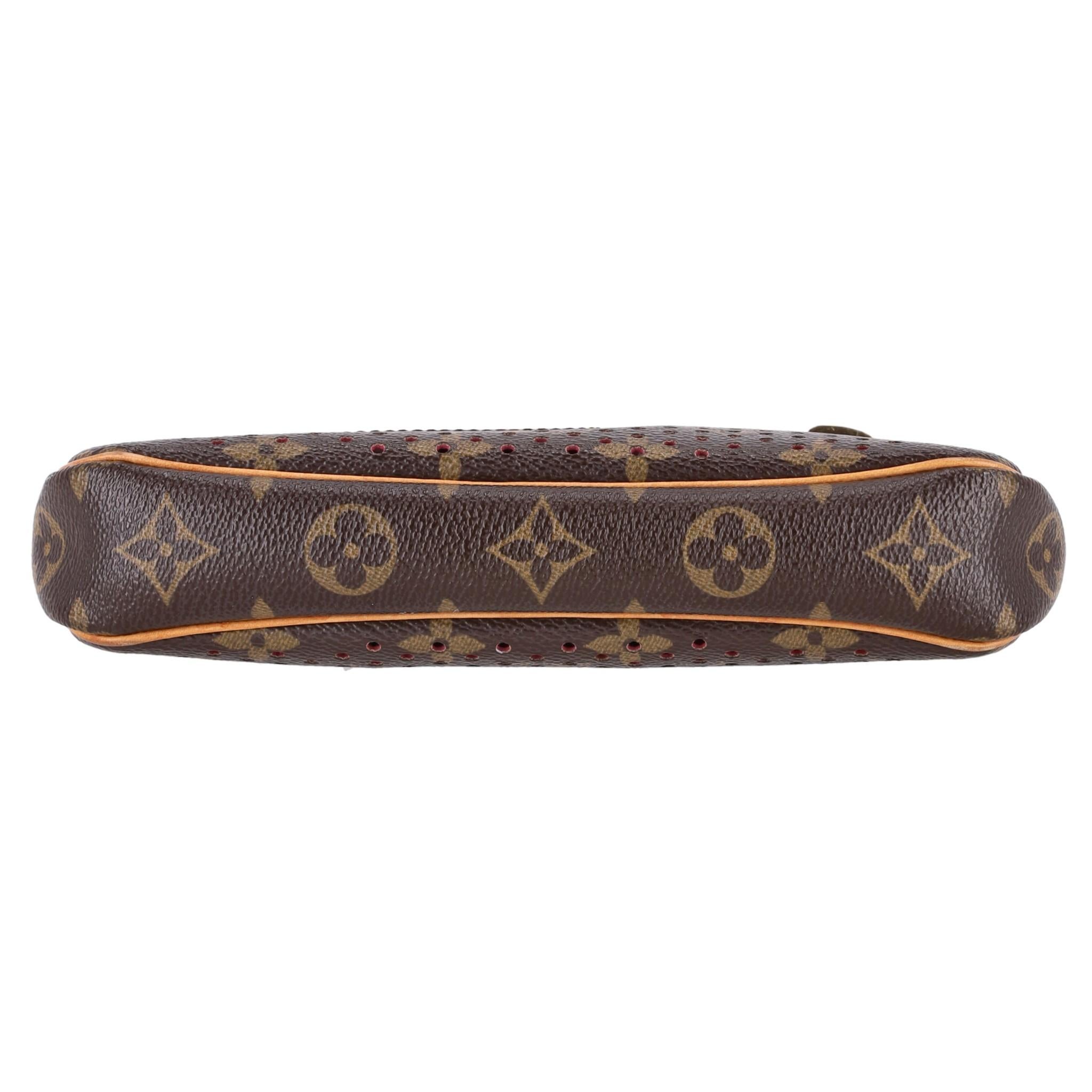Women's or Men's Louis Vuitton Ltd Edition Monogram Perforated Coated Canvas Pochette Bag For Sale