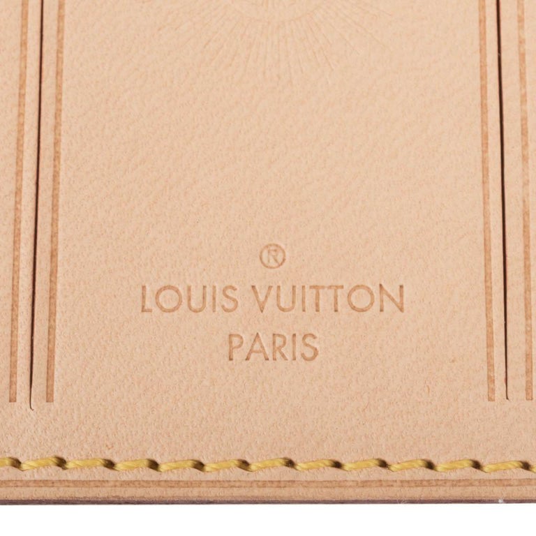 Louis Vuitton luggage tag with Hawaii flower heat stamped in gold on ebene  and in fuchsia on vachetta