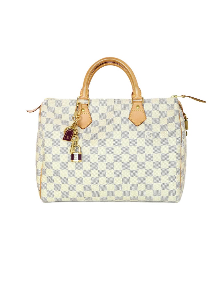Louis Vuitton LV Burgundy/Gold Porte Cles Cadenas Lock/Key Bag Charm/Key Chain For Sale at 1stdibs