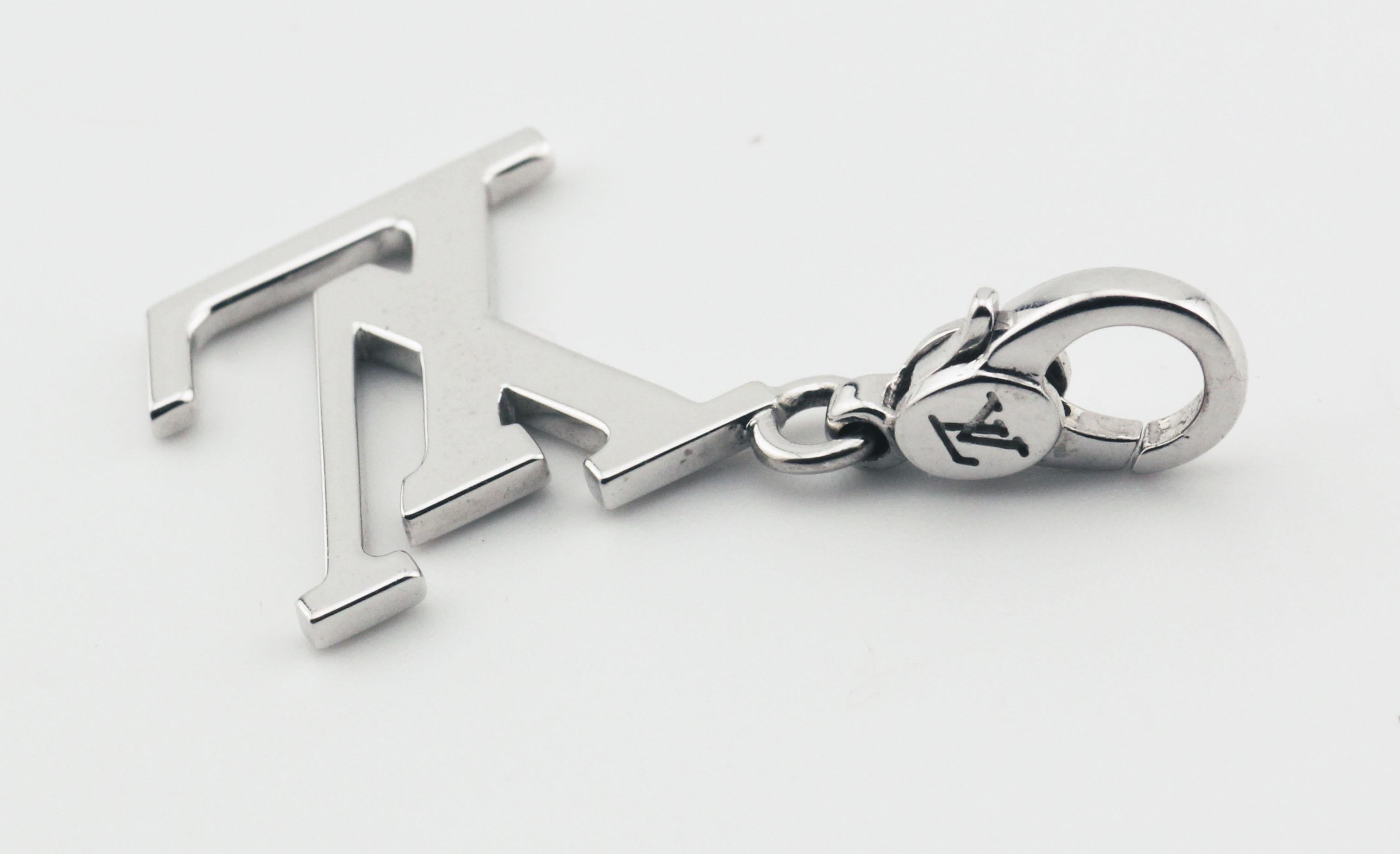 Women's or Men's Louis Vuitton LV Logo 18k White Gold Charm Pendant For Sale