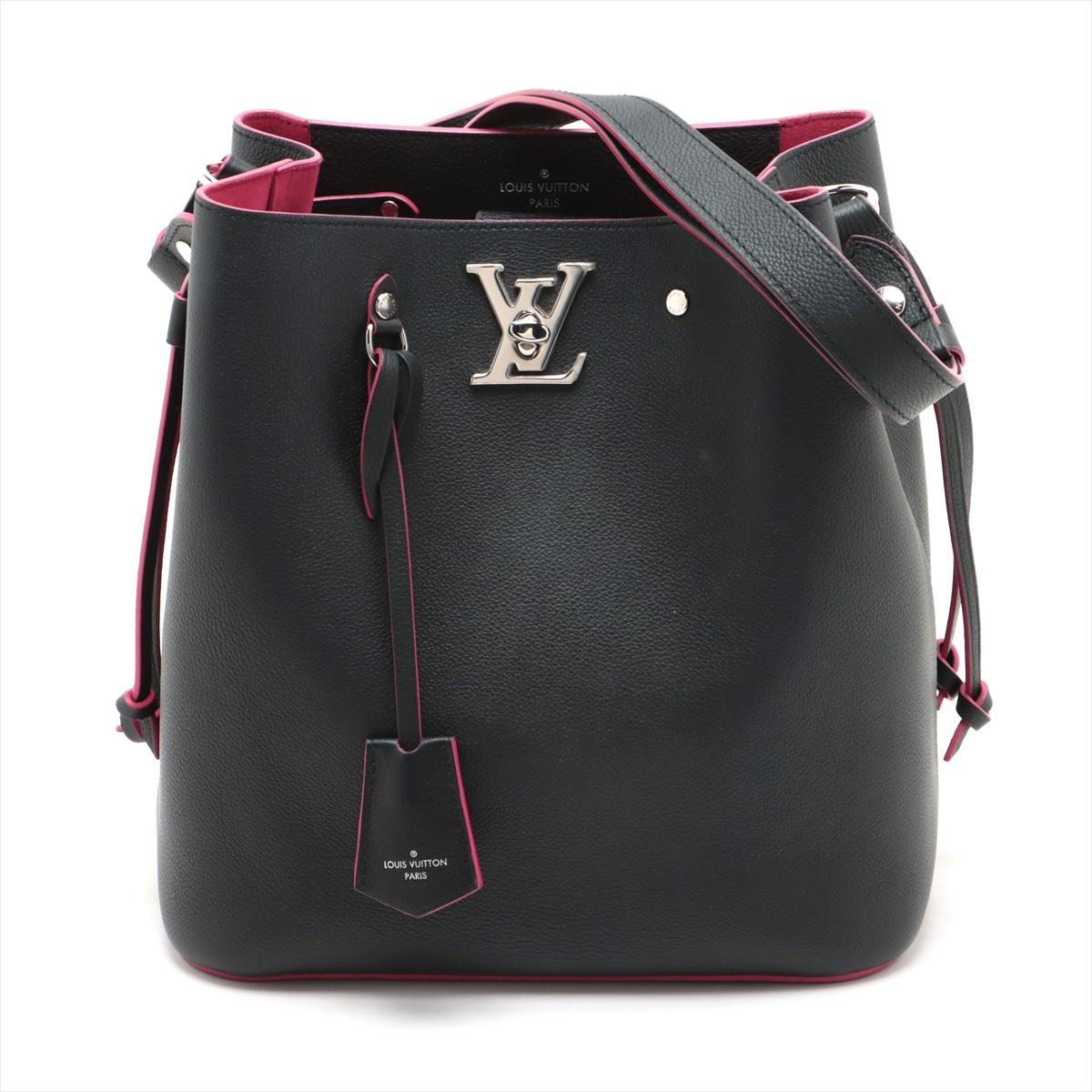The Louis Vuitton LV Logo Lockme Bucket Shoulder Bag in Black and Fuchsia a stylish and contemporary addition to the Lockme collection that perfectly encapsulates Louis Vuitton's iconic aesthetic. The bucket bag features smooth black leather