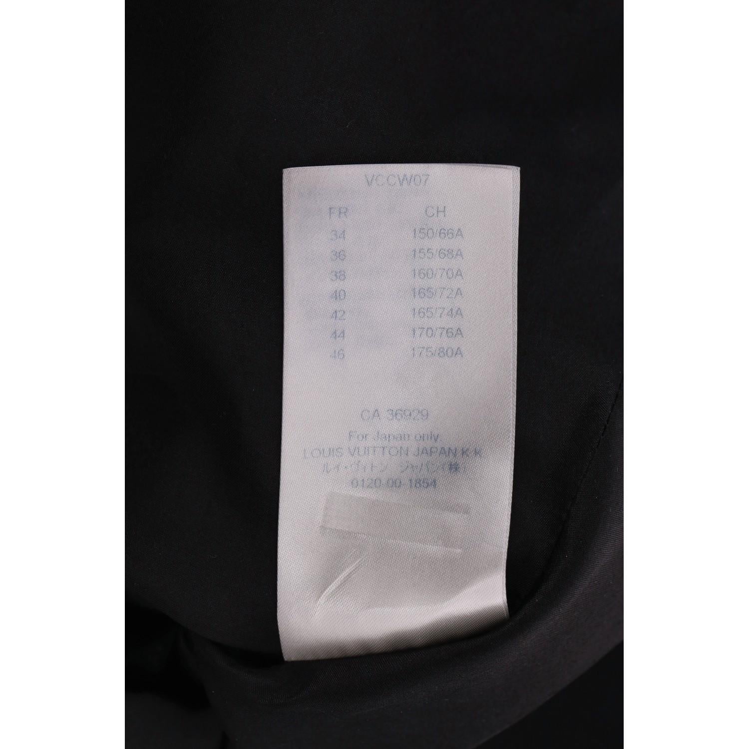 Louis Vuitton 'LV' Logo Rivet Mini Skirt For Sale 4