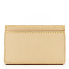 LOUIS VUITTON LV logo trunk embossed tan Vachetta leather cardholder wallet