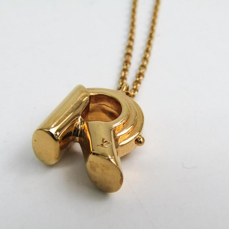 Louis Vuitton LV and Me Gold Tone R Pendant Necklace For Sale at 1stDibs