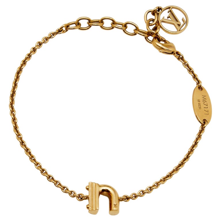 Louis Vuitton Lv & me bracelet, letter l (M67169)