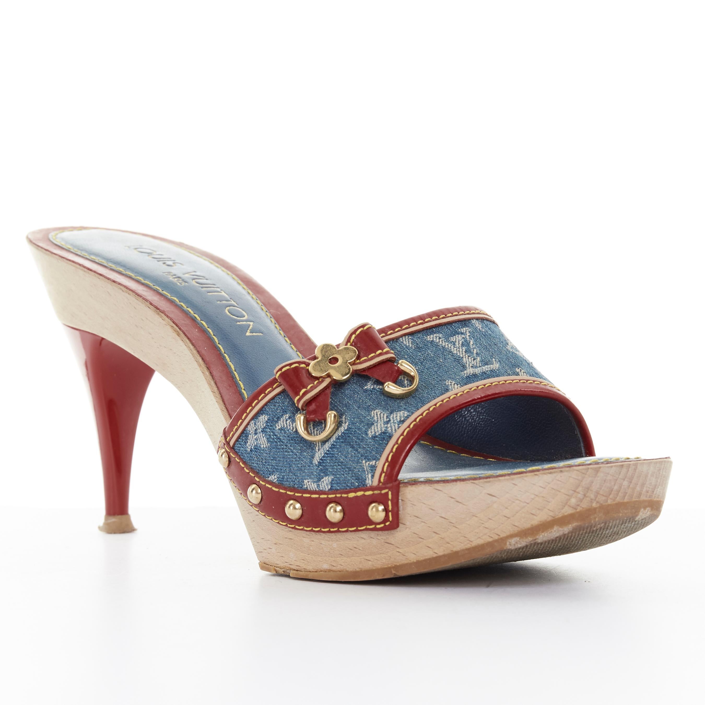 LOUIS VUITTON LV monogram blue denim red bow patent wooden clog sandals EU36 Reference: TGAS/A02988 
Brand: Louis Vuitton 
Model: Clog 
Material: Fabric 
Color: Blue 
Pattern: Other 
Extra Detail: Mid (22.9 in) heel height. Open toe. Slim heel.