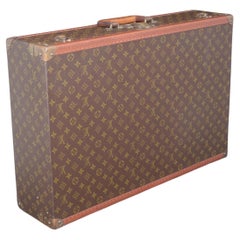 Retro Louis Vuitton LV Monogram 'Fly-el' Suitcase, circa 1985