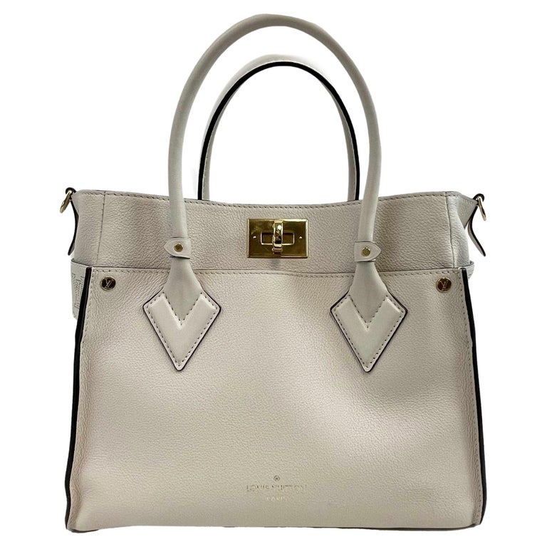 Louis Vuitton - LV On My Side MM Beige Leather Top Handle w/ Shoulder Strap  For Sale at 1stDibs