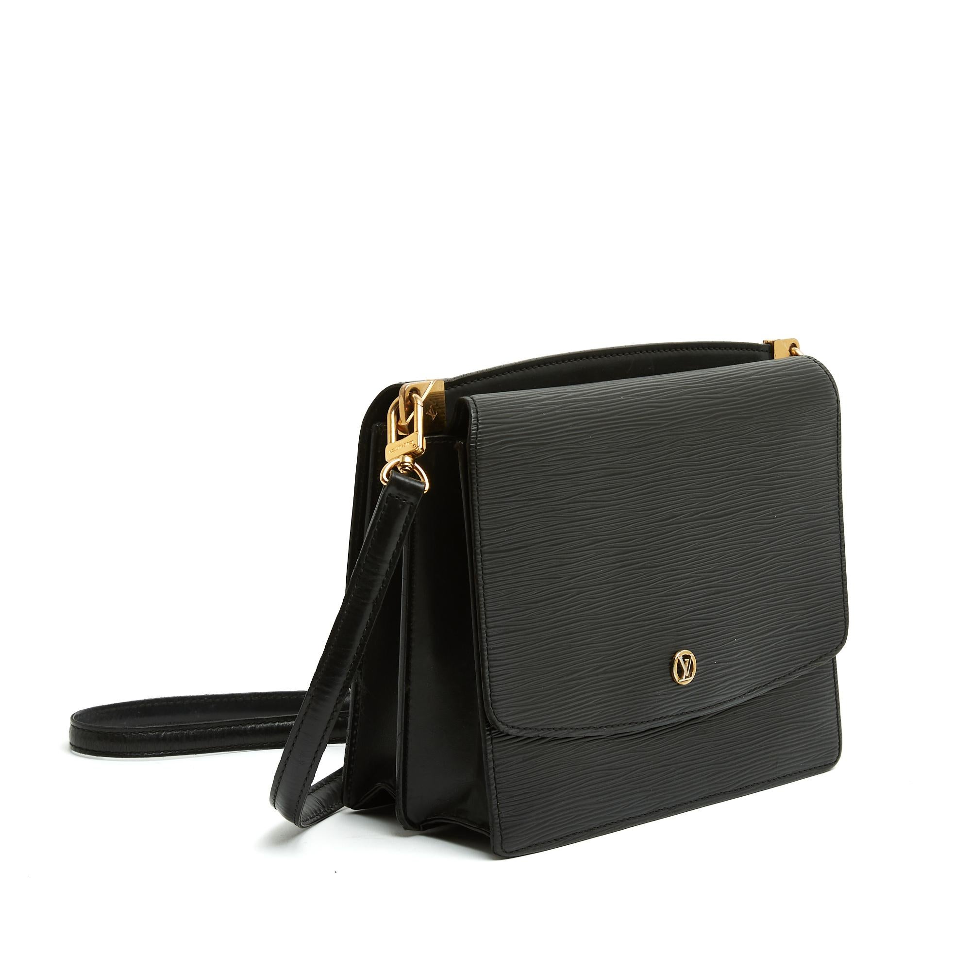 Louis Vuitton Grenelle model bag in black epi leather, a large flap compartment on each side, black leather interior, removable and adjustable shoulder or crossbody strap. Width 23.7 cm x height 19.8 cm x depth 9 cm, shoulder strap 100 cm (no longer