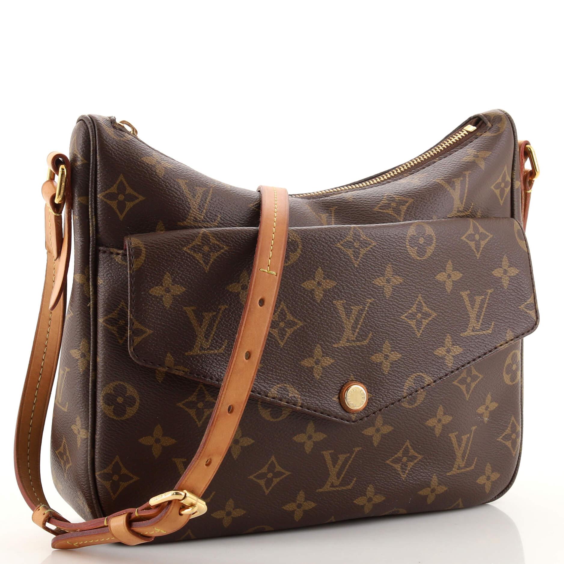 Condition: Good. Odor in interior. Creasing and wear on exterior, heavy darkening, wear, scuffs and watermarks on leather trims and strap, peeling on strap and strap base trim wax edges. Moderate wear, marks and stains in interior, scratches,