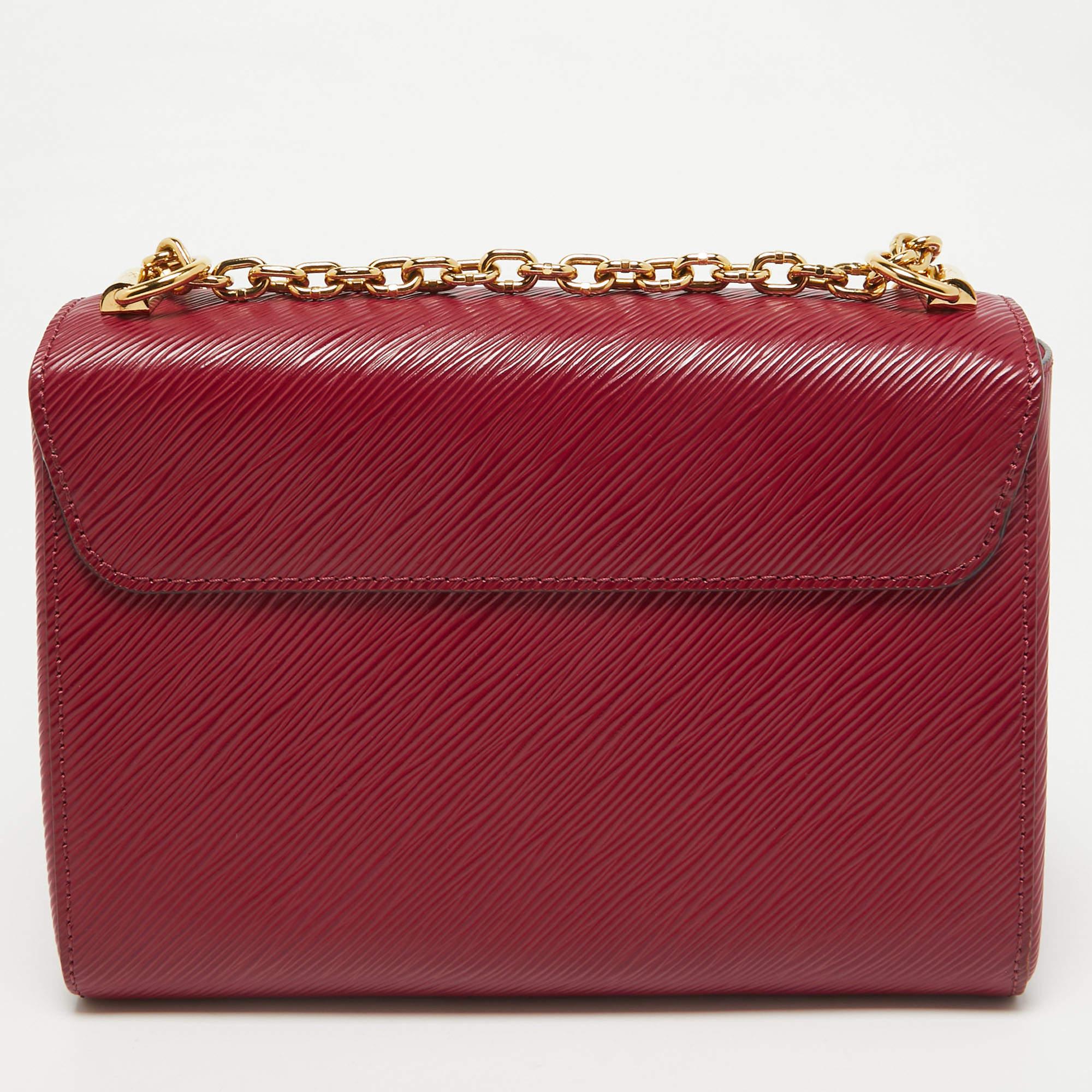 Louis Vuitton Magenta Epi Leather Twist MM Bag In Excellent Condition In Dubai, Al Qouz 2