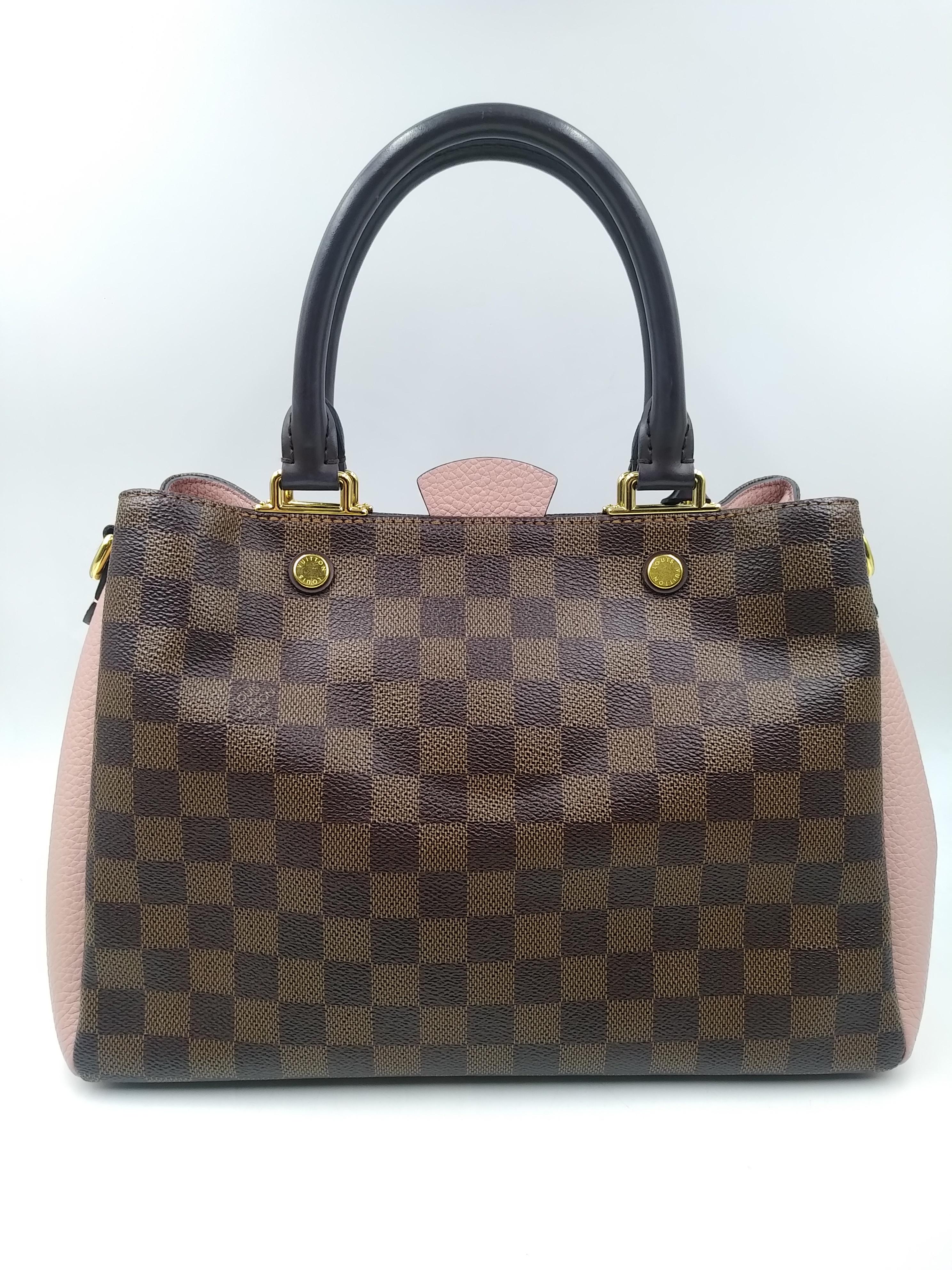 Louis Vuitton Magnolia Damier Canvas Brittany Bag, 2018
- 100% authentic Louis Vuitton
- Damier coated canvas with pebbled leather
- Double rolled leather top handles and a long detachable leather strap
- Open top with middle magnetic snap closure
-