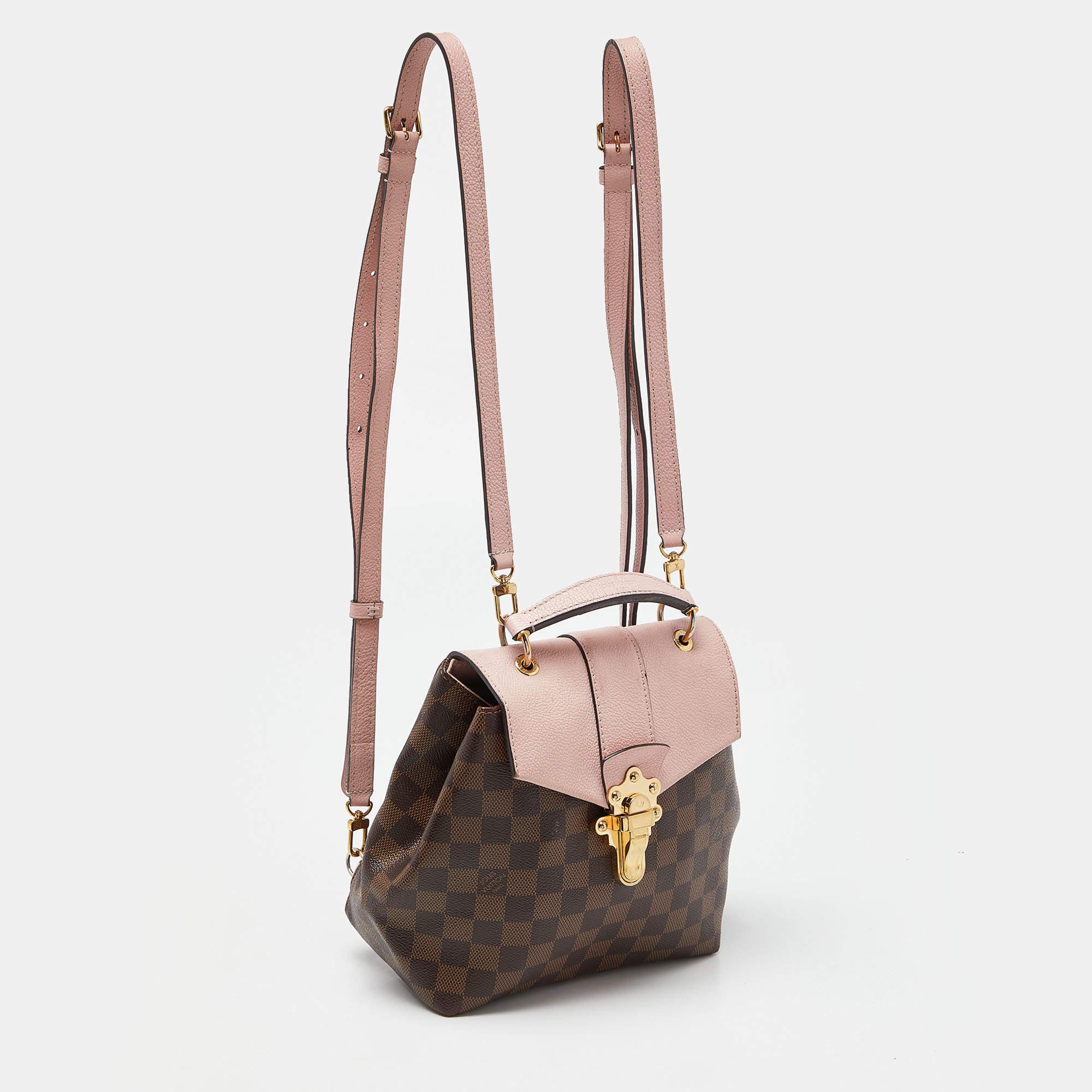 For days of ease and fashion, Louis Vuitton brings you this Clapton backpack. It is made from the brand's signature Damier Ebene canvas as well as leather into a lovely design. The creation features a gold-tone lock on the flap, a leather top