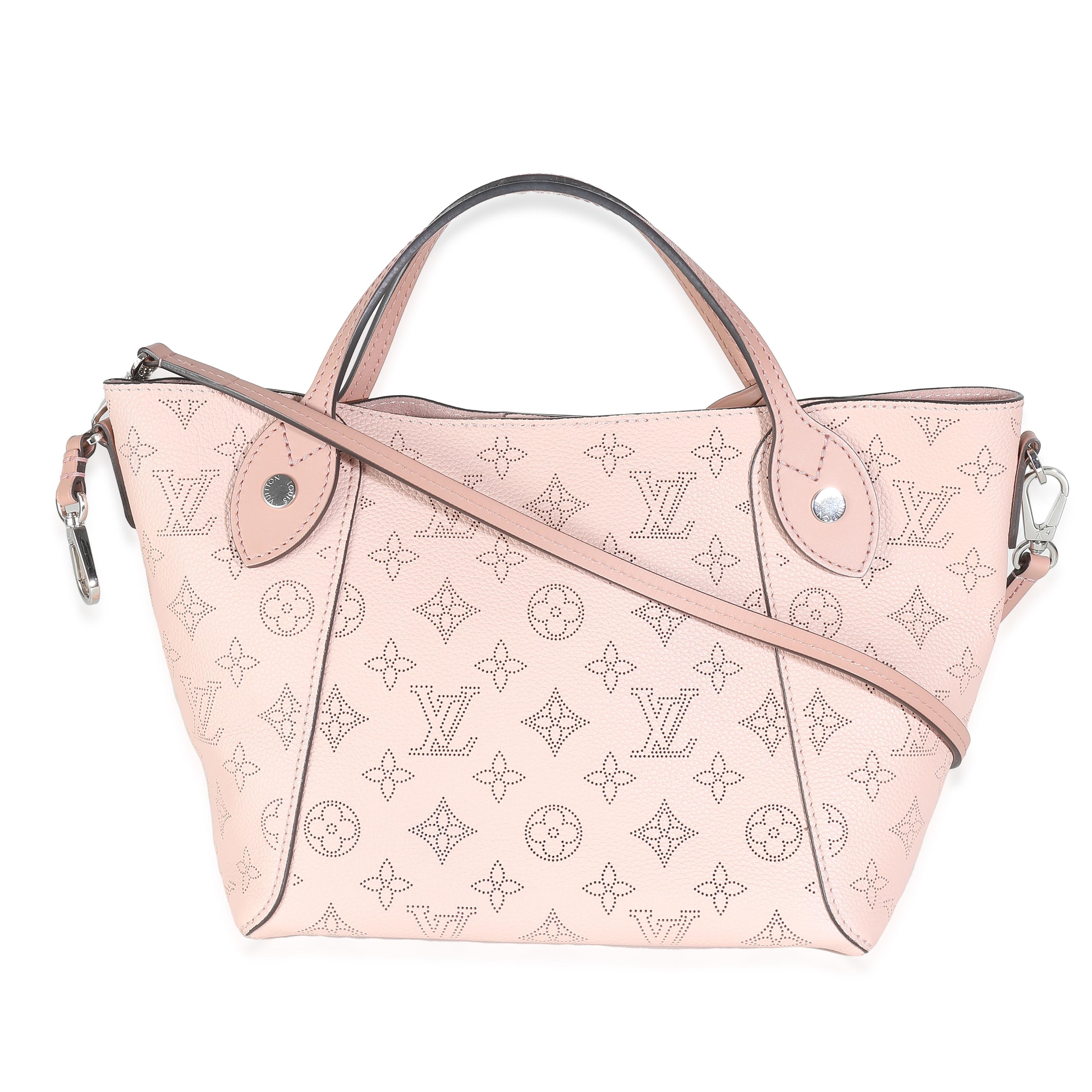 Listing Title: Louis Vuitton Magnolia Mahina Hina PM
SKU: 139912
Condition: Pre-owned 
Condition Description: Designed to be compact yet large enough to hold the essentials, the Louis Vuitton cosmetic pouch matches the House's bags with Damier and