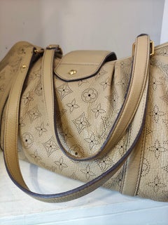 Louis Vuitton Mahina Lunar Pm beige perforated shoulder bag