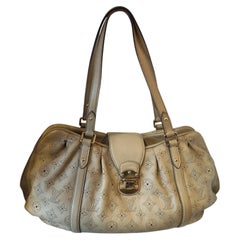 Louis Vuitton Mahina Lunar Pm beige perforated shoulder bag
