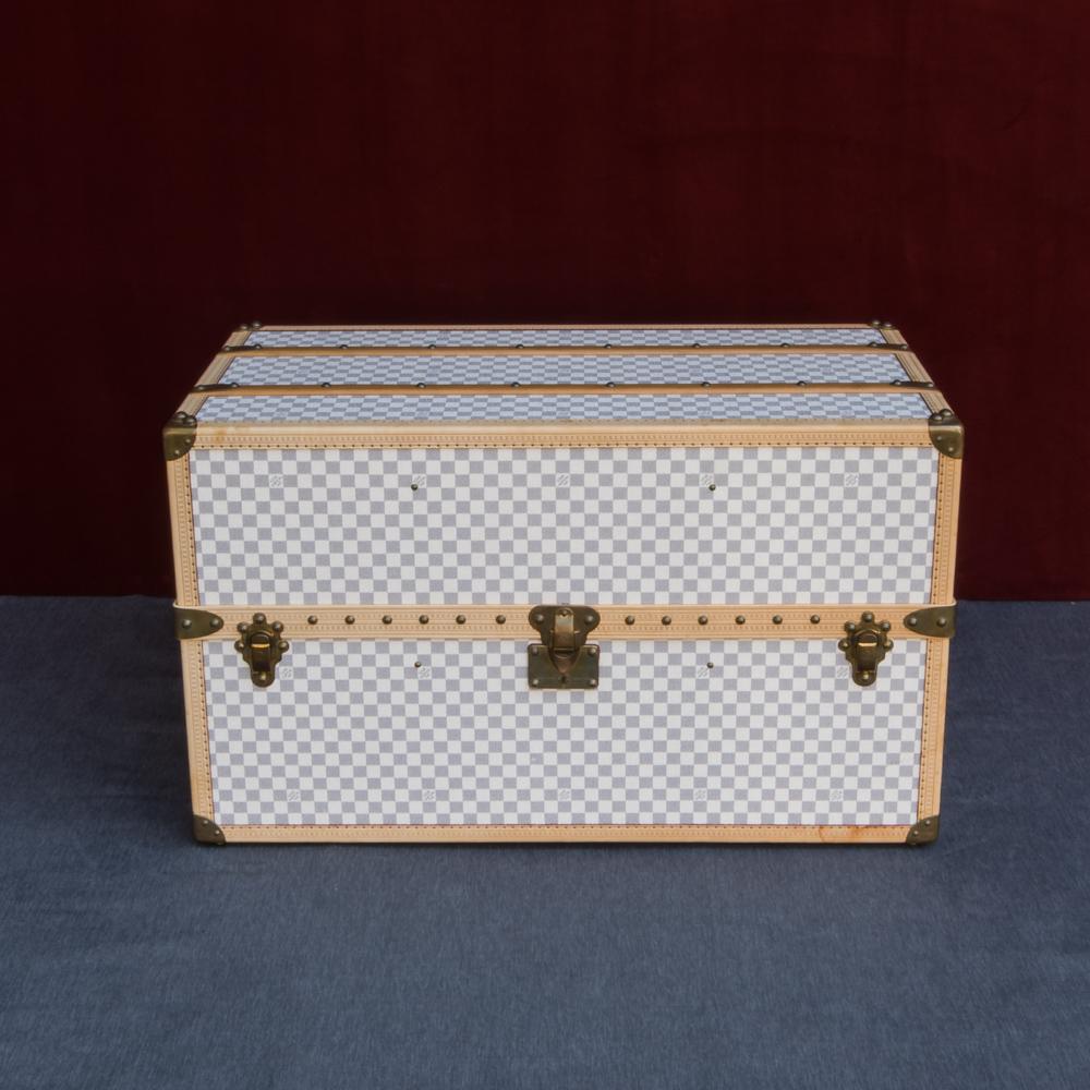 An incredibly rare Louis Vuitton bed trunk finished in Damier Azur pattern coated canvas with leather trim and brass fittings. This trunk was originally bought from the Louis Vuitton Paris flagship store in 2007. Although there are some signs of age
