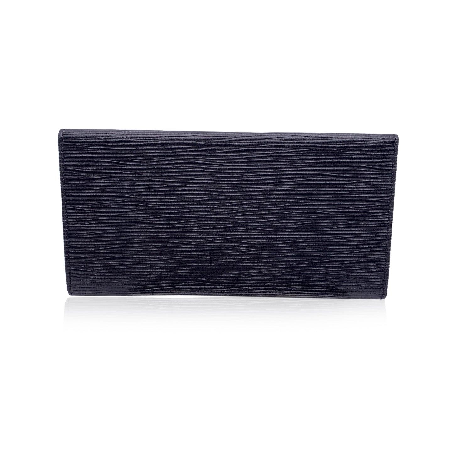 Louis Vuitton black Epi Leather Long Bifold Bill Wallet. Flap closure. LV - LOUIS VUITTON logo embossed on the flap. Leather lining. 1 main compartments inside and 1 open pocket under the flap. 'LOUIS VUITTON Malletier' engraved inside. 'Made in