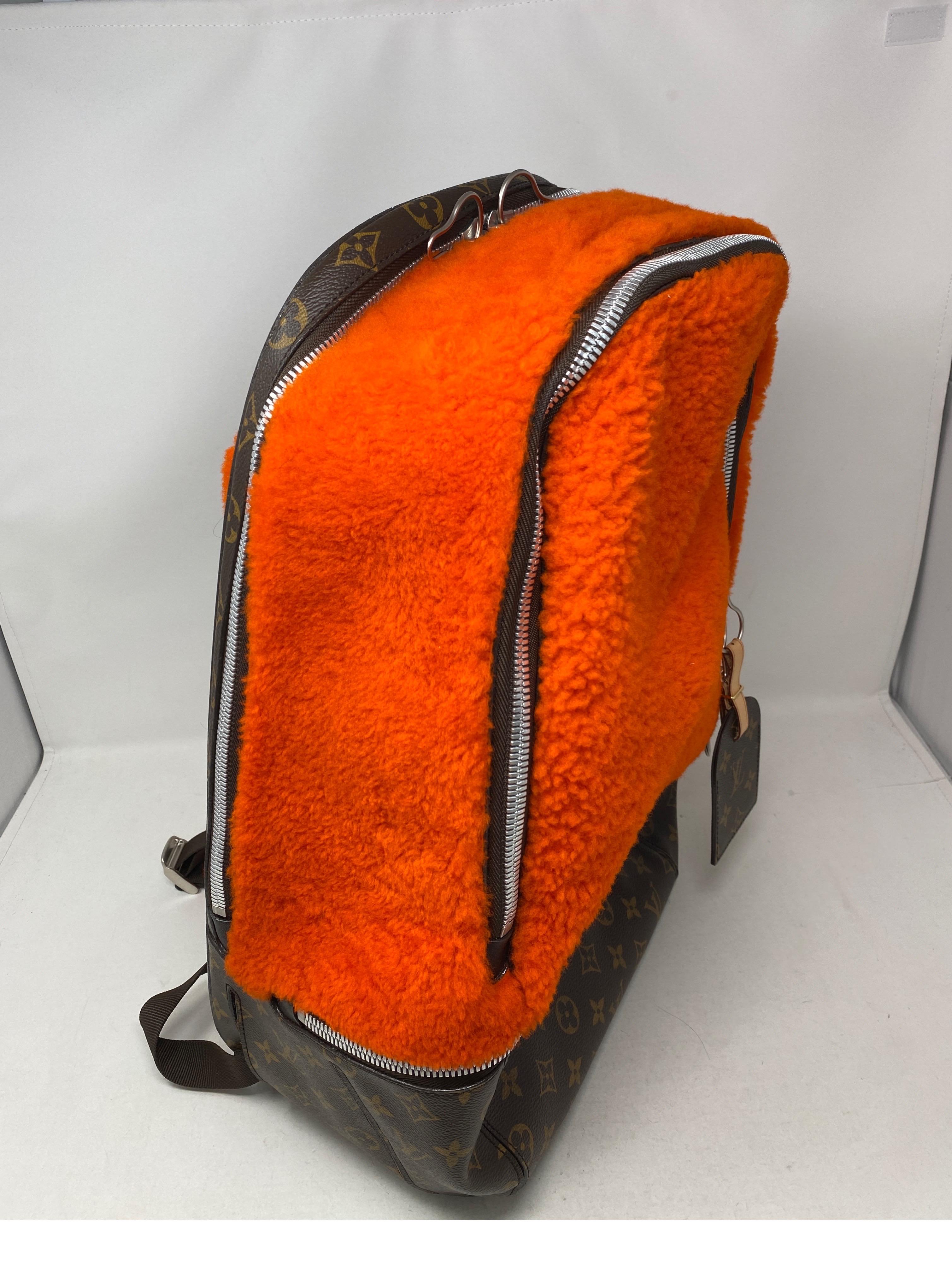 orange louis vuitton backpack