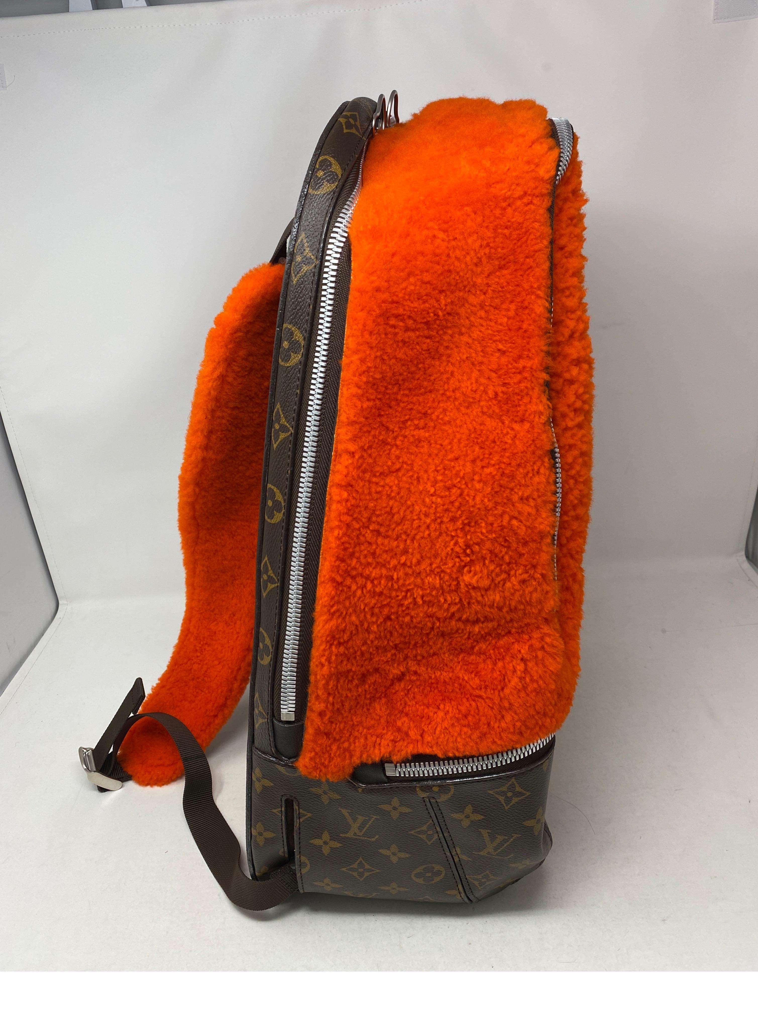 louis vuitton backpack orange
