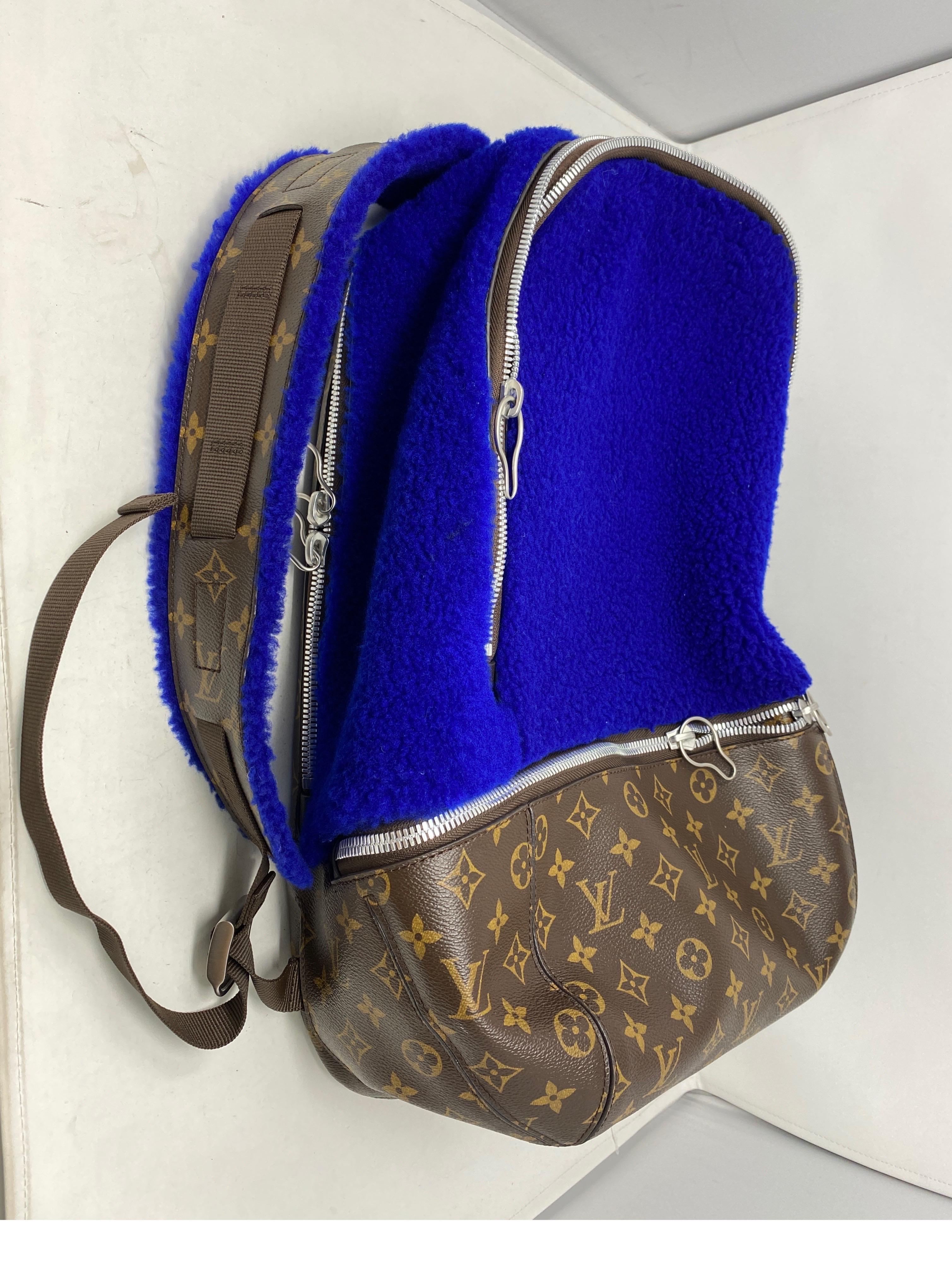 Louis Vuitton Marc Newson Blue Shearling and Monogram Backpack. Limited and rare. Collector's piece. Bright blue shearling fur and monogram canvas. Silver hardware. Excellent like new condition. Guaranteed authentic. 
