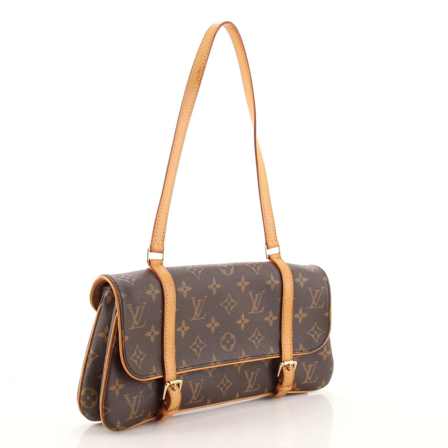 Condition: Very good. Odor in interior. Light creasing on exterior, moderate darkening, wear, scuffs and watermarks on leather trims and handle. Wear, marks and stains underneath flap and in interior, scratches and tarnish on hardware.
Accessories: