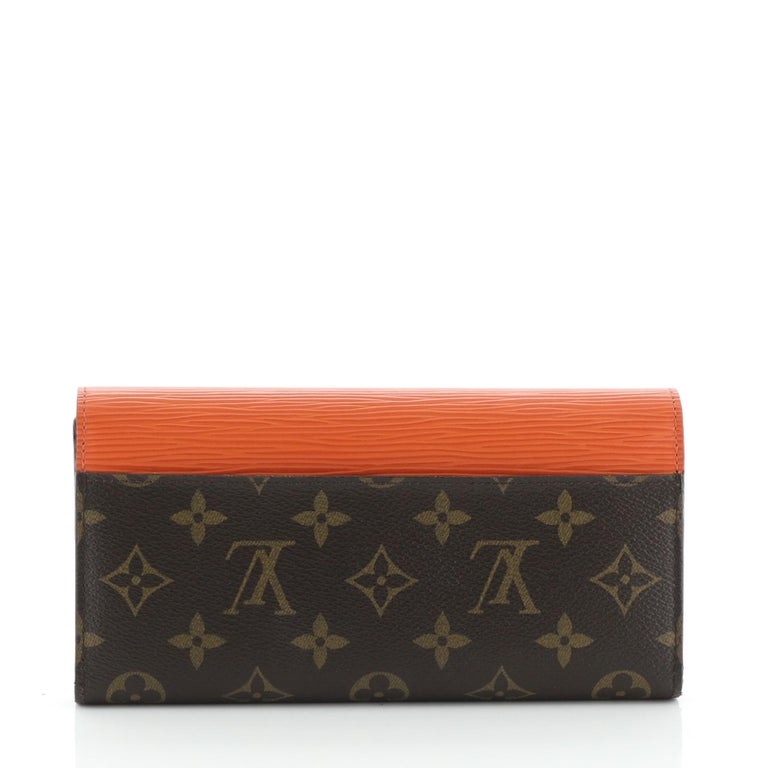 Louis Vuitton Marie-Lou Wallet, the brown monogram coated canvas and orange  epi leather with silver button snap, opening to one card holder, one coin  sold at auction on 3rd December