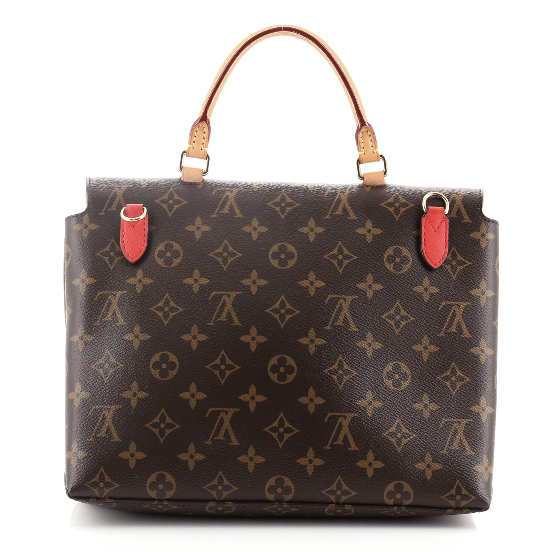 Louis Vuitton Marignan Handbag Monogram Canvas with Leather
Monogram Brown Red Leather

Condition Details: Odor in interior. Darkening, scuffs, wear and watermarks on handle, peeling on strap wax edges, creasing, wear and small indentations