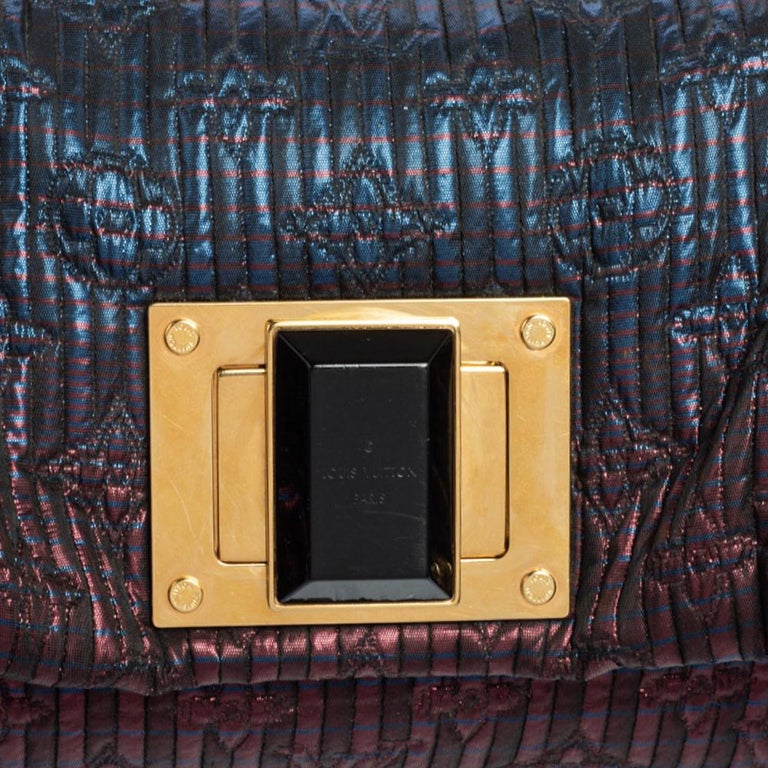 A LOUIS VUITTON CALFSKIN MONOGRAM ALTAIR CLUTCH BAG, with a black