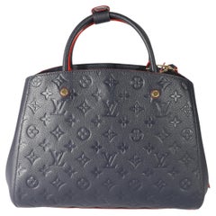 Louis Vuitton Marine Rouge Empreinte Montaigne MM