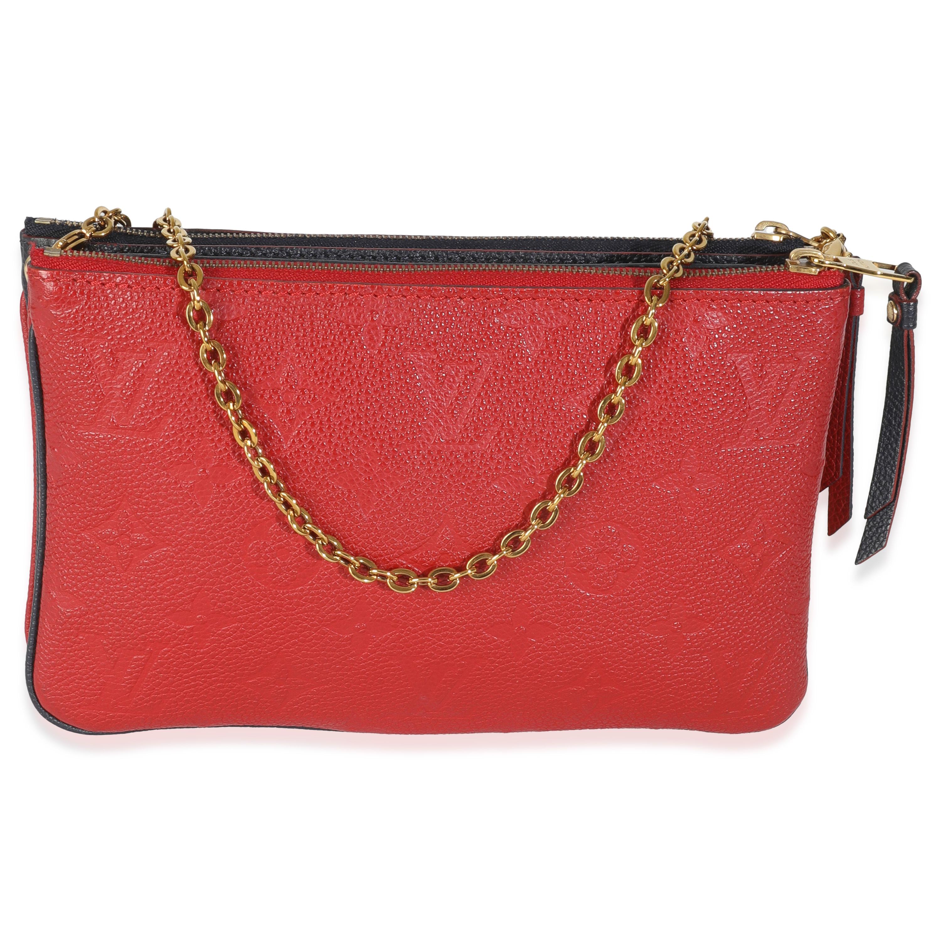 Titolo dell'elenco: Louis Vuitton Marine Rouge Monogram Empreinte Double Zip Pochette
SKU: 147046
Condizioni: Usato 
Condizioni della borsa: Molto buono
Commenti sulle condizioni: L'articolo è in ottime condizioni con lievi segni di usura.  Graffi