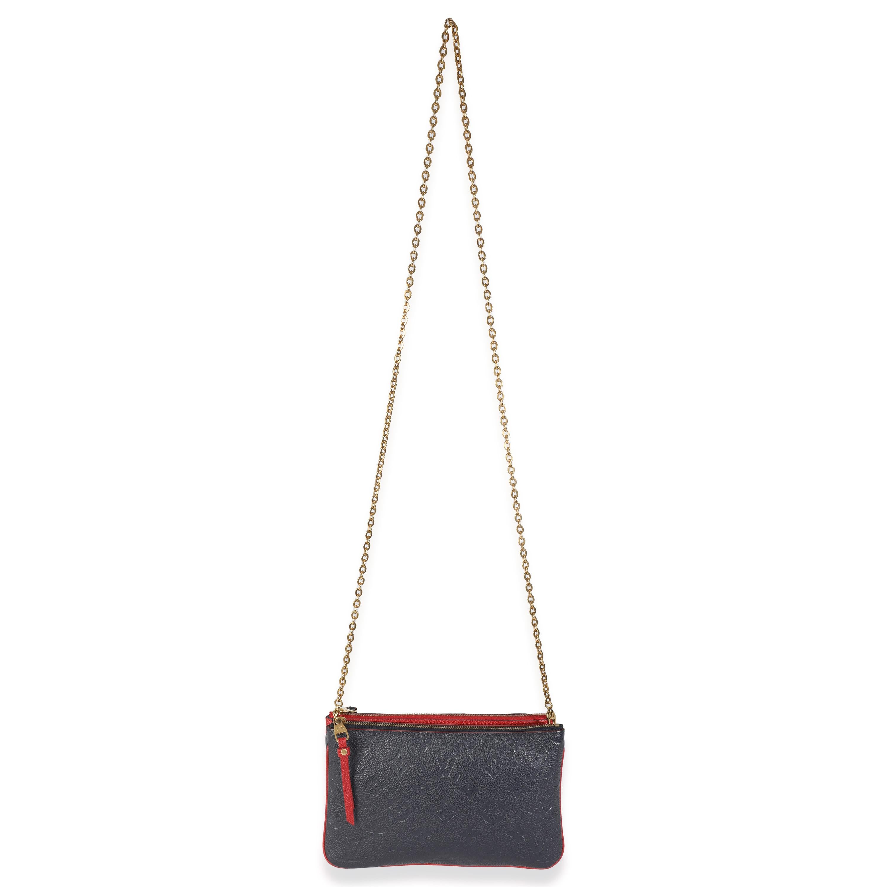 Louis Vuitton Marine Rouge Monogram Empreinte Doppia Zip Pochette in vendita 1