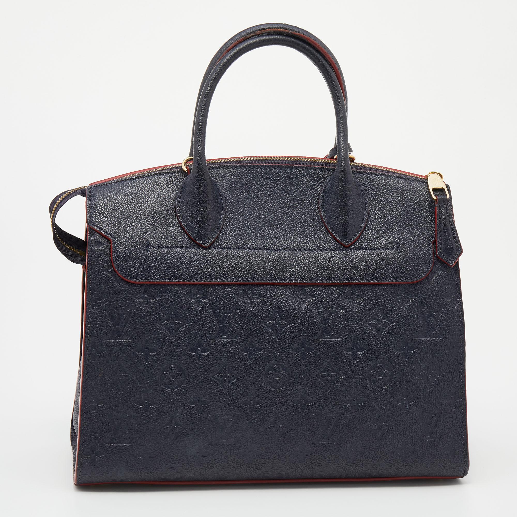 Designed to delight and assist you on all days, this Pont Neuf MM by Louis Vuitton is a bag worth buying! Rendered in a sturdy silhouette, this bag is crafted from Monogram Empreinte leather, and features top rolled handles and an optional