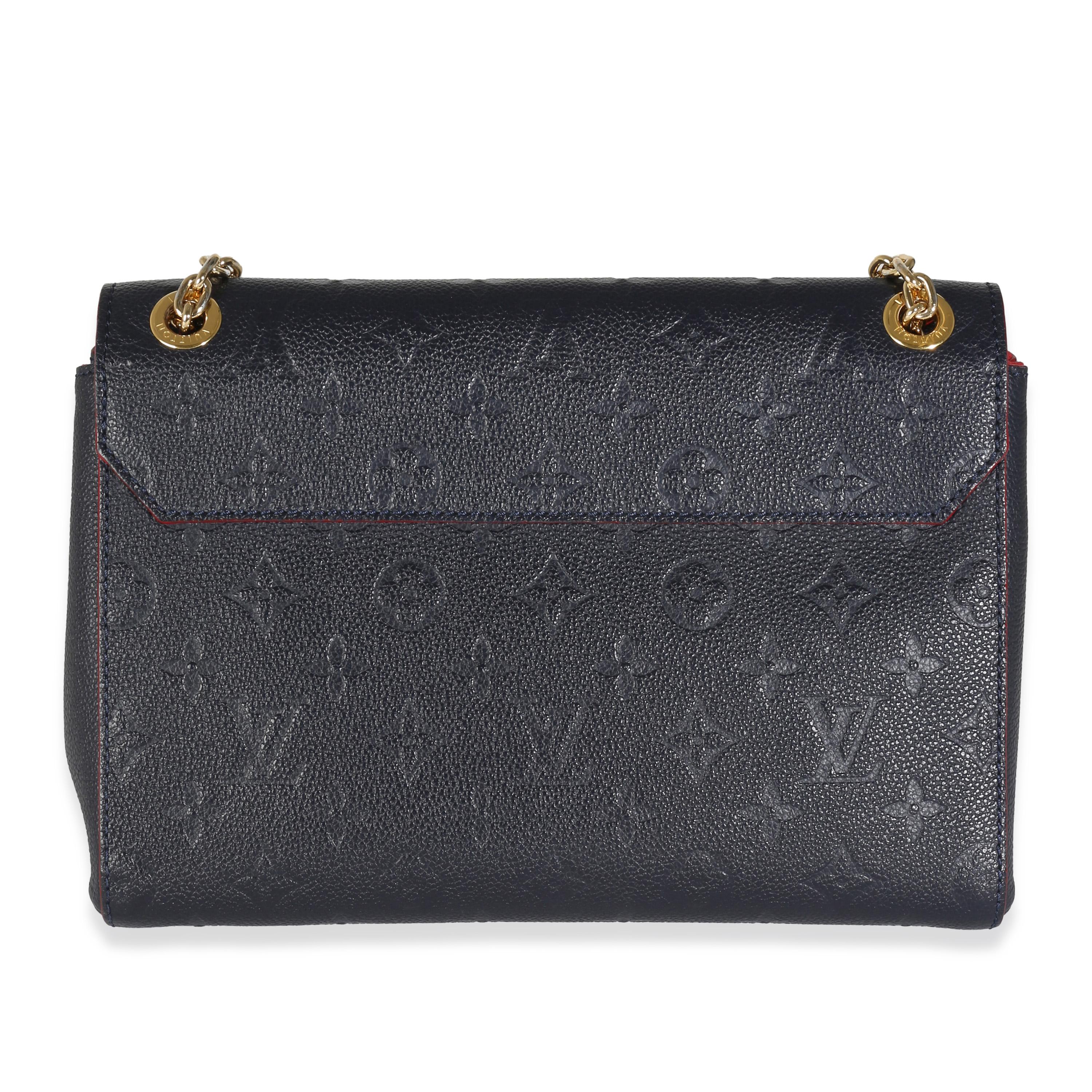 Listing Title: Louis Vuitton Marine Rouge Monogram Empreinte Vavin PM
SKU: 141960
Condition: Pre-owned 
Handbag Condition: Very Good
Condition Comments: Item is in very good condition with minor signs of wear.  Minor marks along exterior leather.