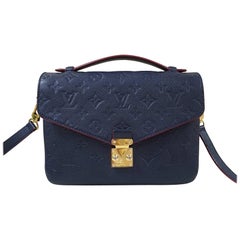 Louis Vuitton Marine Rouge Navy Blue Empreinte Pochette Metis