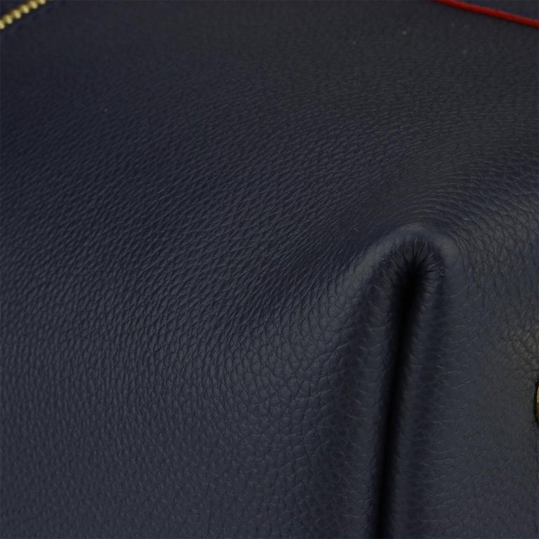 Louis Vuitton Marine & Rouge Monogram Empreinte Leather Melie