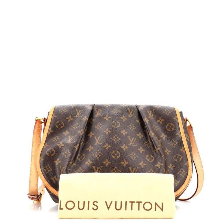 WOULD LIKE TO TRADE FOR A SMALLER CROSSBODY. AUTH. Louis Vuitton  Menilmontant