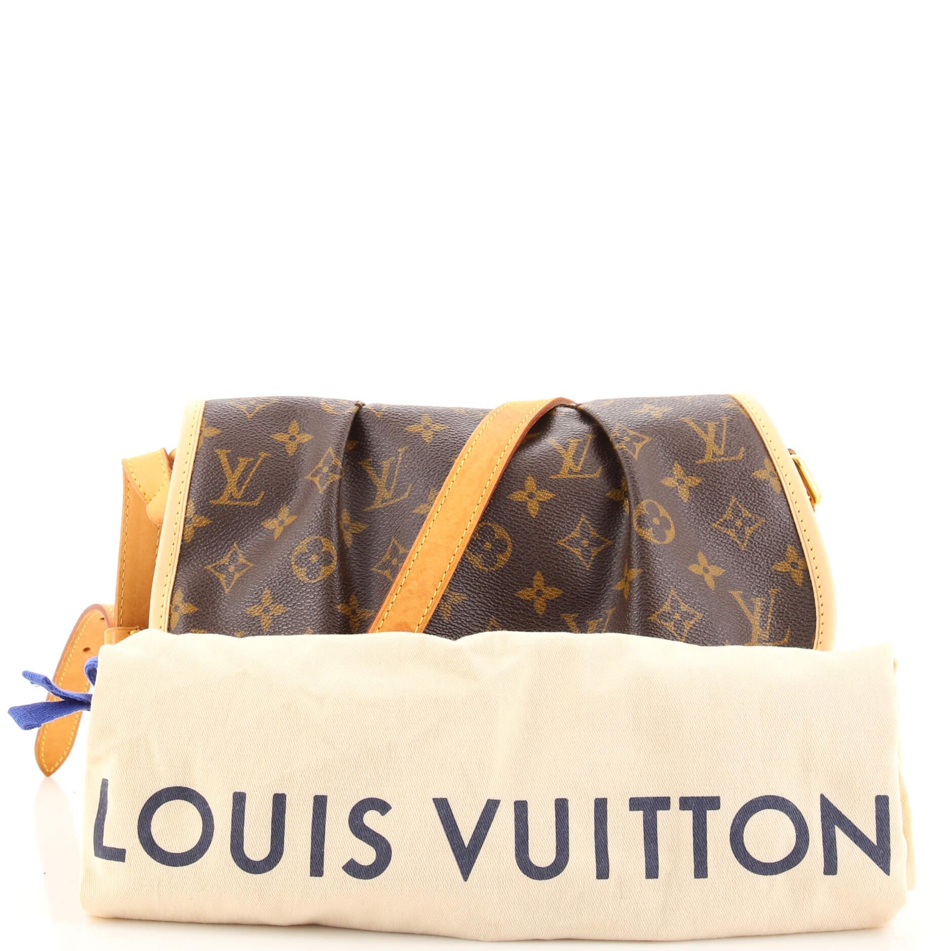 Condition: Very good. Creasing on exterior, darkening and watermarks on strap and leather trims. Peeling on strap wax edges, small marks underneath flap and in interior, scratches and discoloration on hardware.
Accessories: Dust Bag
Measurements: