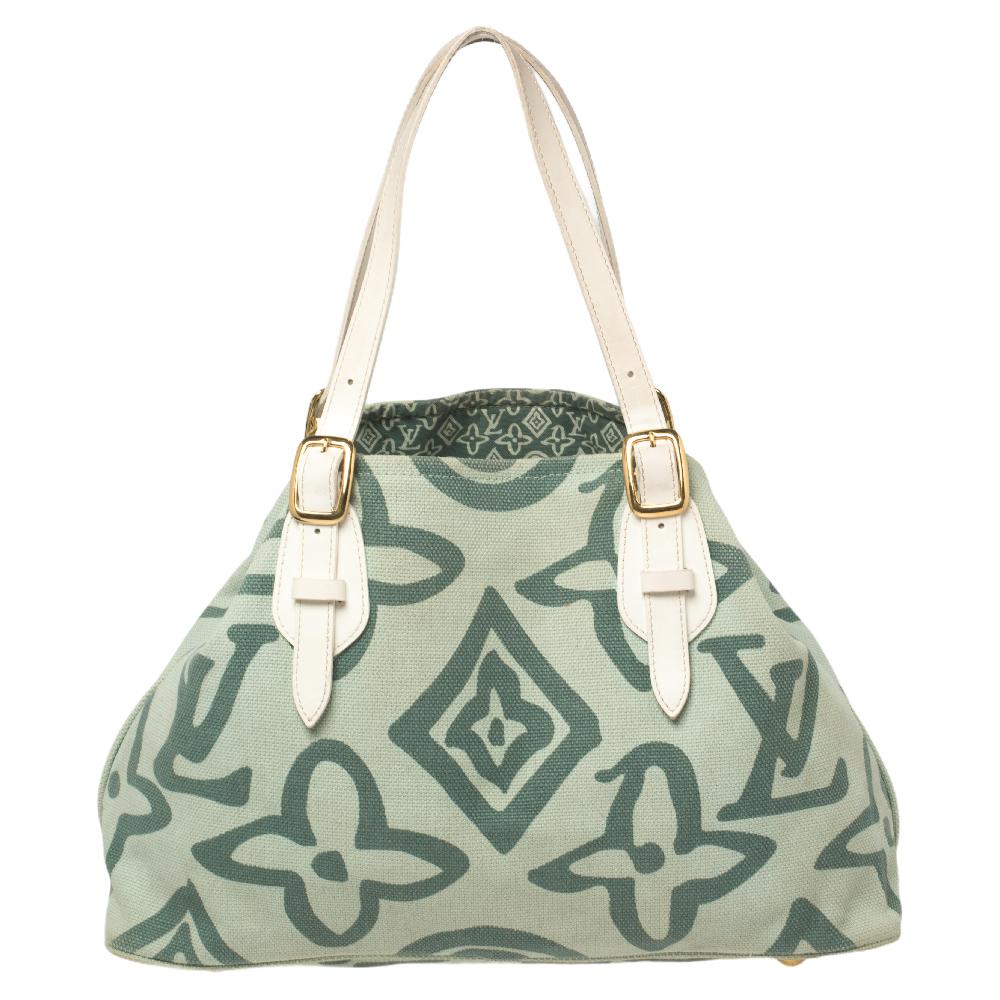 A chic and artsy blend makes this Louis Vuitton bag truly desirable and easy to love. The unique colors of the Tahitienne Cabas collection are inspired by Paul Gauguin, a post-impressionist painter who is known for his bold use of color.