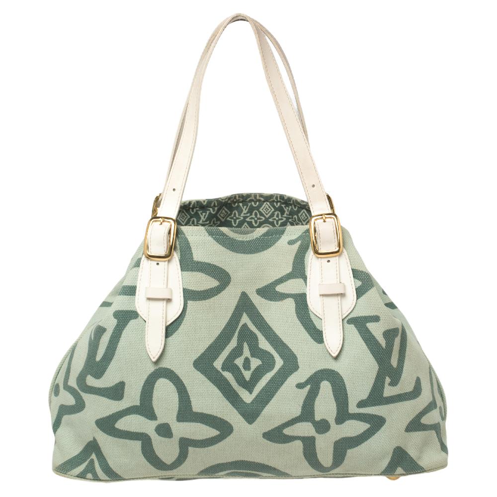 A chic and artsy blend makes this Louis Vuitton bag truly desirable and easy to love. The unique colors of the Tahitienne Cabas collection are inspired by Paul Gauguin, a post-impressionist painter who is known for his bold use of color.