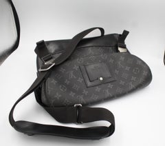 Louis Vuitton Messenger Bag , in eclipse LV monogram.